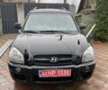Чорний Хендай Туксон, об'ємом двигуна 1.98 л та пробігом 202 тис. км за 7350 $, фото 1 на Automoto.ua