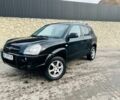 Черный Хендай Туксон, объемом двигателя 2 л и пробегом 310 тыс. км за 6600 $, фото 1 на Automoto.ua