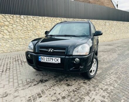 Черный Хендай Туксон, объемом двигателя 2 л и пробегом 310 тыс. км за 6600 $, фото 1 на Automoto.ua