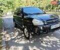 Черный Хендай Туксон, объемом двигателя 2 л и пробегом 247 тыс. км за 6300 $, фото 8 на Automoto.ua