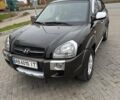 Чорний Хендай Туксон, об'ємом двигуна 2 л та пробігом 124 тис. км за 7950 $, фото 1 на Automoto.ua