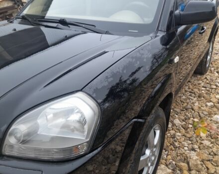 Черный Хендай Туксон, объемом двигателя 2 л и пробегом 230 тыс. км за 6800 $, фото 1 на Automoto.ua