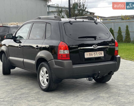 Черный Хендай Туксон, объемом двигателя 2 л и пробегом 216 тыс. км за 7500 $, фото 4 на Automoto.ua