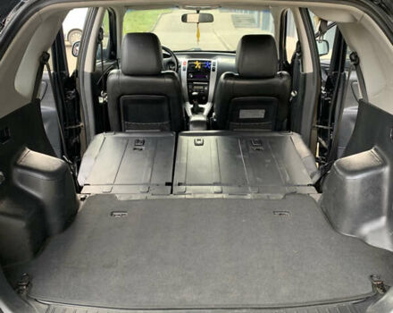 Черный Хендай Туксон, объемом двигателя 1.99 л и пробегом 290 тыс. км за 7700 $, фото 8 на Automoto.ua