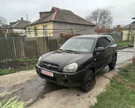 Черный Хендай Туксон, объемом двигателя 2 л и пробегом 395 тыс. км за 4500 $, фото 3 на Automoto.ua