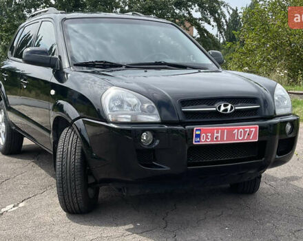 Черный Хендай Туксон, объемом двигателя 2 л и пробегом 236 тыс. км за 6950 $, фото 7 на Automoto.ua