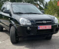 Черный Хендай Туксон, объемом двигателя 2 л и пробегом 236 тыс. км за 6950 $, фото 7 на Automoto.ua