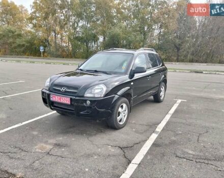 Черный Хендай Туксон, объемом двигателя 2 л и пробегом 127 тыс. км за 7590 $, фото 21 на Automoto.ua