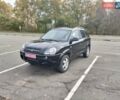 Черный Хендай Туксон, объемом двигателя 2 л и пробегом 127 тыс. км за 7590 $, фото 21 на Automoto.ua