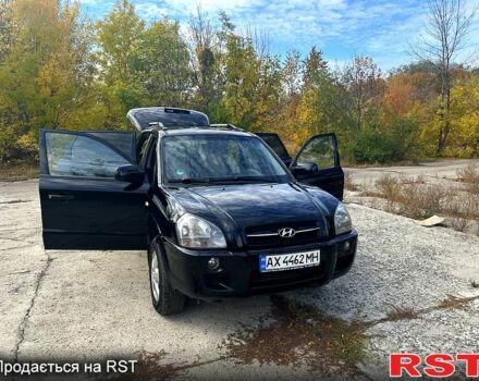 Черный Хендай Туксон, объемом двигателя 2 л и пробегом 250 тыс. км за 7500 $, фото 1 на Automoto.ua