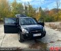 Черный Хендай Туксон, объемом двигателя 2 л и пробегом 250 тыс. км за 7500 $, фото 1 на Automoto.ua