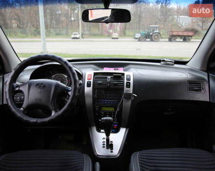 Черный Хендай Туксон, объемом двигателя 2.66 л и пробегом 217 тыс. км за 8600 $, фото 11 на Automoto.ua