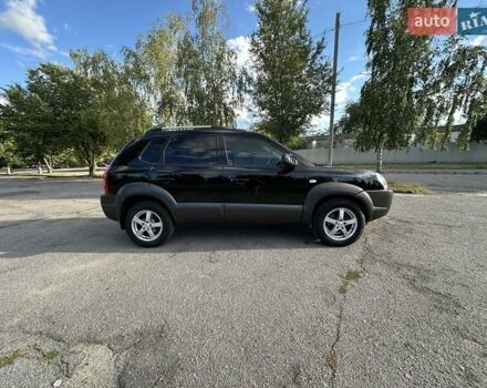 Чорний Хендай Туксон, об'ємом двигуна 2 л та пробігом 249 тис. км за 5800 $, фото 7 на Automoto.ua