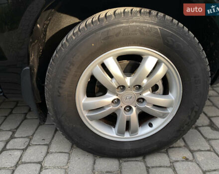 Чорний Хендай Туксон, об'ємом двигуна 1.98 л та пробігом 233 тис. км за 7650 $, фото 26 на Automoto.ua