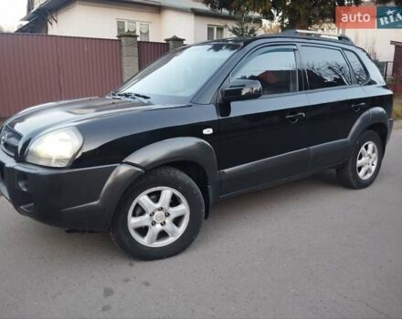 Чорний Хендай Туксон, об'ємом двигуна 1.99 л та пробігом 239 тис. км за 6990 $, фото 1 на Automoto.ua