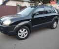 Чорний Хендай Туксон, об'ємом двигуна 1.99 л та пробігом 239 тис. км за 6990 $, фото 1 на Automoto.ua