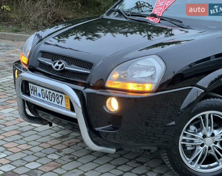 Чорний Хендай Туксон, об'ємом двигуна 1.98 л та пробігом 170 тис. км за 6999 $, фото 8 на Automoto.ua
