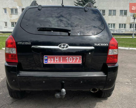 Черный Хендай Туксон, объемом двигателя 2 л и пробегом 236 тыс. км за 6950 $, фото 4 на Automoto.ua