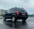 Черный Хендай Туксон, объемом двигателя 1.98 л и пробегом 230 тыс. км за 7800 $, фото 4 на Automoto.ua