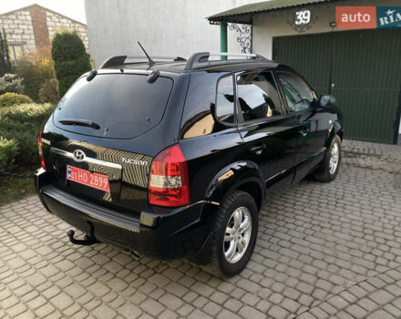 Чорний Хендай Туксон, об'ємом двигуна 1.98 л та пробігом 233 тис. км за 7650 $, фото 4 на Automoto.ua