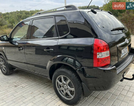 Чорний Хендай Туксон, об'ємом двигуна 2 л та пробігом 144 тис. км за 6599 $, фото 12 на Automoto.ua