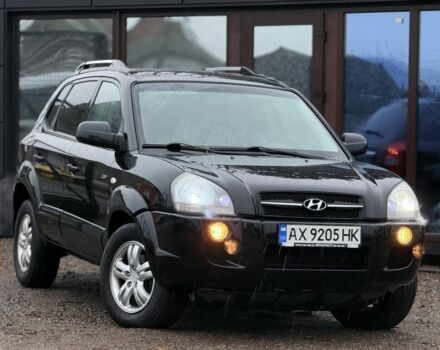 Черный Хендай Туксон, объемом двигателя 2 л и пробегом 263 тыс. км за 7950 $, фото 4 на Automoto.ua