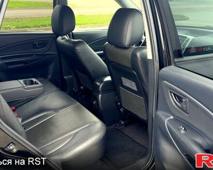 Черный Хендай Туксон, объемом двигателя 2 л и пробегом 200 тыс. км за 7800 $, фото 9 на Automoto.ua