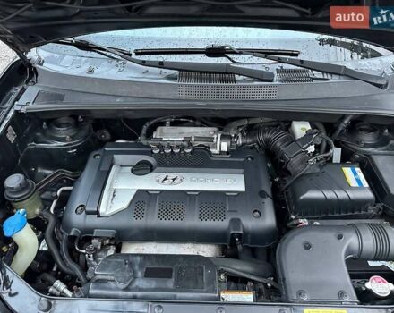 Чорний Хендай Туксон, об'ємом двигуна 2 л та пробігом 167 тис. км за 7950 $, фото 18 на Automoto.ua