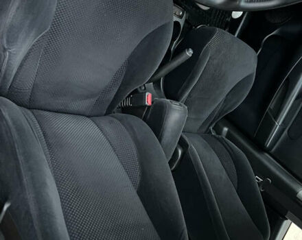 Черный Хендай Туксон, объемом двигателя 1.98 л и пробегом 227 тыс. км за 6900 $, фото 20 на Automoto.ua