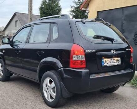 Черный Хендай Туксон, объемом двигателя 1.98 л и пробегом 277 тыс. км за 5350 $, фото 24 на Automoto.ua