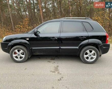 Черный Хендай Туксон, объемом двигателя 1.98 л и пробегом 196 тыс. км за 7700 $, фото 7 на Automoto.ua