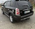 Чорний Хендай Туксон, об'ємом двигуна 2 л та пробігом 124 тис. км за 7950 $, фото 4 на Automoto.ua