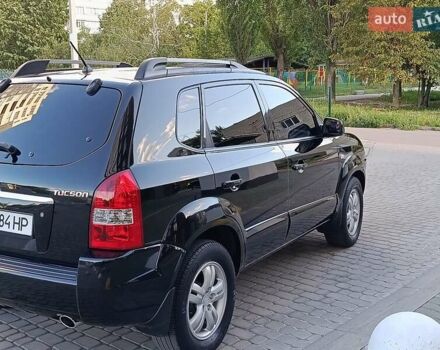 Чорний Хендай Туксон, об'ємом двигуна 2 л та пробігом 141 тис. км за 7999 $, фото 9 на Automoto.ua