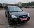 Чорний Хендай Туксон, об'ємом двигуна 2 л та пробігом 190 тис. км за 6999 $, фото 1 на Automoto.ua