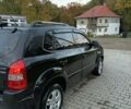 Черный Хендай Туксон, объемом двигателя 1.99 л и пробегом 280 тыс. км за 7700 $, фото 2 на Automoto.ua