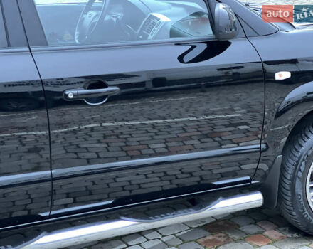 Чорний Хендай Туксон, об'ємом двигуна 1.98 л та пробігом 170 тис. км за 6999 $, фото 18 на Automoto.ua