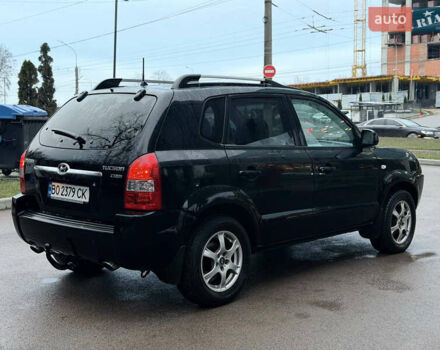 Чорний Хендай Туксон, об'ємом двигуна 1.99 л та пробігом 310 тис. км за 6399 $, фото 14 на Automoto.ua