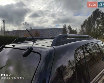 Черный Хендай Туксон, объемом двигателя 2 л и пробегом 237 тыс. км за 7999 $, фото 41 на Automoto.ua