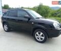 Черный Хендай Туксон, объемом двигателя 2 л и пробегом 216 тыс. км за 6999 $, фото 5 на Automoto.ua