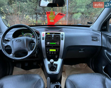 Чорний Хендай Туксон, об'ємом двигуна 1.98 л та пробігом 170 тис. км за 6999 $, фото 54 на Automoto.ua