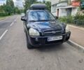 Черный Хендай Туксон, объемом двигателя 1.98 л и пробегом 219 тыс. км за 8100 $, фото 7 на Automoto.ua
