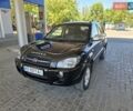 Чорний Хендай Туксон, об'ємом двигуна 1.98 л та пробігом 226 тис. км за 8800 $, фото 1 на Automoto.ua