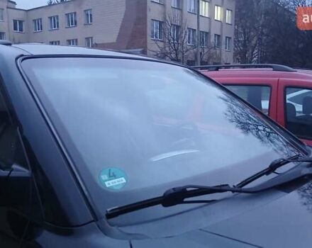 Черный Хендай Туксон, объемом двигателя 1.98 л и пробегом 320 тыс. км за 6300 $, фото 8 на Automoto.ua