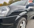 Черный Хендай Туксон, объемом двигателя 2 л и пробегом 127 тыс. км за 7590 $, фото 19 на Automoto.ua