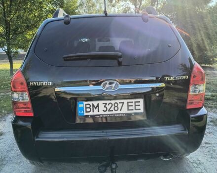 Черный Хендай Туксон, объемом двигателя 2 л и пробегом 206 тыс. км за 7500 $, фото 3 на Automoto.ua