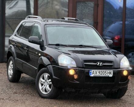 Черный Хендай Туксон, объемом двигателя 2 л и пробегом 263 тыс. км за 7950 $, фото 2 на Automoto.ua