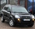 Черный Хендай Туксон, объемом двигателя 2 л и пробегом 263 тыс. км за 7950 $, фото 2 на Automoto.ua