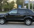 Черный Хендай Туксон, объемом двигателя 2 л и пробегом 235 тыс. км за 7750 $, фото 2 на Automoto.ua