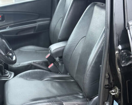 Черный Хендай Туксон, объемом двигателя 1.98 л и пробегом 231 тыс. км за 7750 $, фото 26 на Automoto.ua