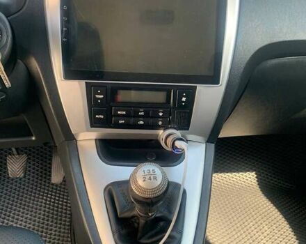 Черный Хендай Туксон, объемом двигателя 1.98 л и пробегом 196 тыс. км за 7700 $, фото 12 на Automoto.ua